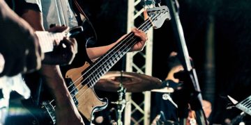 Electric Bass Guitar Vs. 4-String Acoustic Bass: Which Should I Choose?